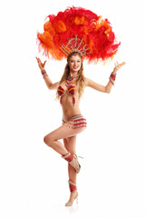 Wall Mural - Brazilian woman posing in samba costume over white background