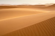golden hills on the dune waves  in desert in Morocco