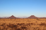 Fototapeta Natura - Two well known flat top mountains in the central Karoo called Koffiebus and Teebus, South Africa.