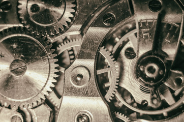 The mechanism of old antique pocket watches, Close up view of old clock's gears. selective focus