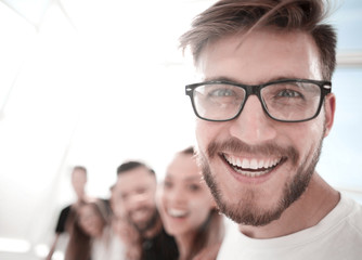 Wall Mural - successful young man on the background of the business team