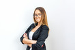 © Bojan Topalovic - Young businesswoman posing at work.