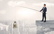 © ra2 studio - Businessman fishing sack of currency from the cityscape concept