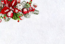 Christmas Decoration. Flower Of Red Poinsettia, Twigs Christmas Tree, Christmas Red Balls, Cones Pine And Red Berries Covered Snow On Snow With Space For Text. Top View, Flat Lay
