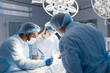 © alfa27 - Surgeon doctor operating using electric scalpel wearing blue surgical mask and surgical cap in surgery room with his team surgeons operating