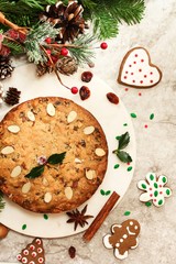 Sticker - Homemade Christmas fruitcake on festive Xmas holiday background