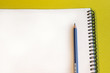 © Карина Желнина - Clean sheet and pencil top view on a green background. The desk concept.
