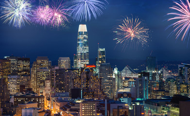 Wall Mural - Downtown San Francisco cityscape with flashing fireworks Celebrating New Years Eve