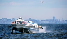 Vibrant View Of Meteor Jet Boat Traveling By The Surface Of Baltic Sea Bay Of Saint Petersburg In Daytime