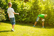 © Patryk - Son playing with his father footbal in a park, having fun