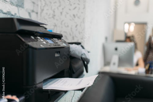 Fotografia Copier with contract, equipment in business office