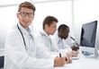 © ASDF - group of doctors conducting laboratory studies