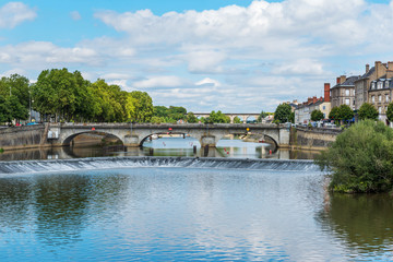 Wall Mural - Bridge.Banks of the Mayenne river, City of Laval, Mayenne, Pays de Loire, France. August 5, 2018