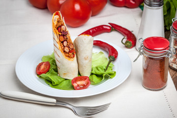 Canvas Print - Burritos filled wiht minced meat, bean and vegetables.