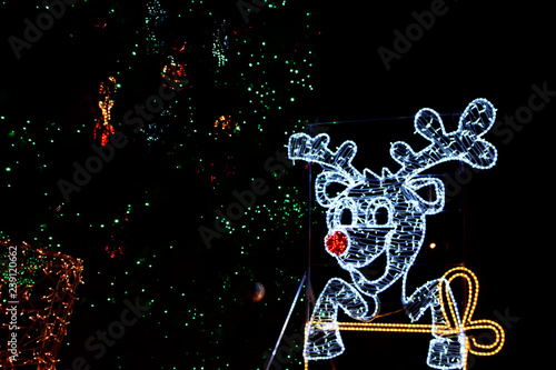 pic Christmas Silhouette Lights Outdoors https stock adobe com images cute shiny smiling christmas deer silhouette from white glowing xmas lights with red nose on dark night background outdoors as winter holiday decoration with copy space for text 239120662 start checkout 1 content id 239120662