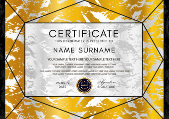 Wall Mural - Golden certificate vector template. Black triangle (geometric) pattern with dark border frame. Gold, silver marble textured  background for Diploma, certificate of appreciation, invitation design