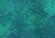 weathered green turquoise colored wall background