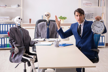 Wall Mural - Funny business meeting with boss and skeletons