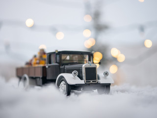 Wall Mural - Christmas truck with loaded gifts and bear. Christmas teddy bear and gifts loaded on a car.