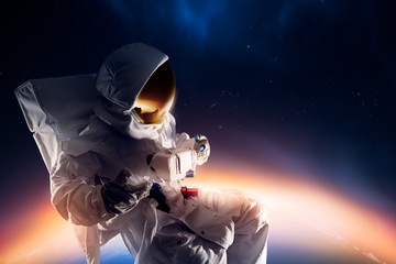 Wall Mural - astronaut exploring outer space