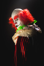Scary Clown On A Dark Background