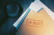 © fergregory - private detective desk with envelopes labeled as top secret