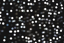 Defocured Abstract White Black Bokeh Background. Nice Background For Christmas Or Romantic Project.