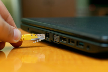 connect the Internet wire cable to a laptop into the connector