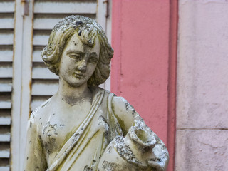 Statues in a front yard, selective focus