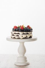 Wall Mural - delicious homemade whoopie pie cake with fresh blueberries and strawberries