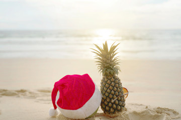 Concept Christmas on the beach with sun shining,prayed for blessings,natural, creative, tropical style background made in Phuket, Thailand.