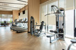 © tampatra - Modern fitness center with gym equipment decoration. interior design background