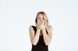 © Bangkok Click Studio - Beautiful woman covering mouth by her hands.