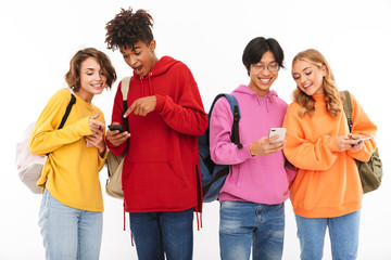 Wall Mural - Group of cheerful teenagers isolated