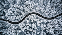Driving In Forest After Snowfall, Aerial Drone View