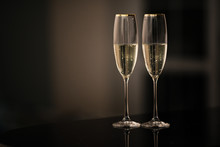 A Pair Of Glasses Of Champagne In The Interior. New Year And Others Holiday Concept.