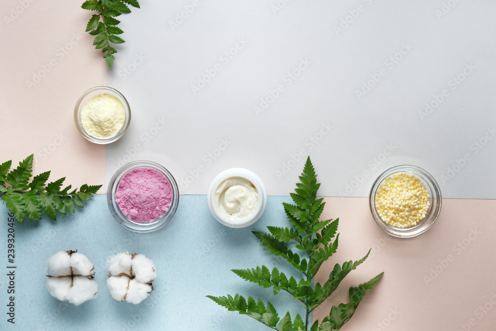 Composition with cosmetic products on color background