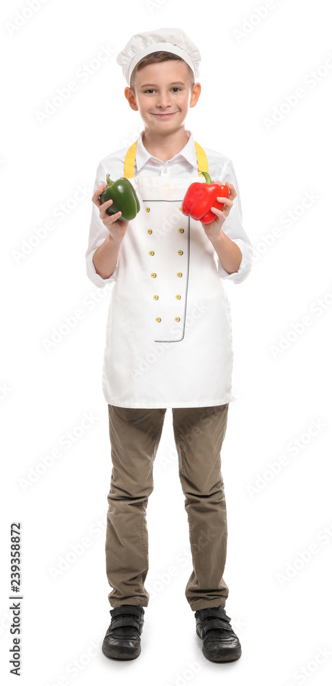 Cute little chef with peppers on white background