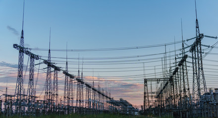 Wall Mural - High-voltage power lines. Electricity distribution station. high voltage electric transmission tower. Distribution electric substation with power lines and transformers