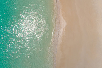  Aerial top view beautiful sea landscape, beach and wave with turquoise sea water with copy space
