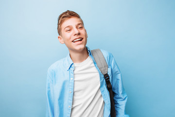 Cute teenager with a briefcase, student