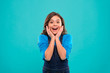 © be free - Sincere excitement. Kid girl long healthy shiny hair wear casual clothes. Little girl excited happy face. Kid happy cute face feels excited blue background. Exciting moments. Excitement emotion