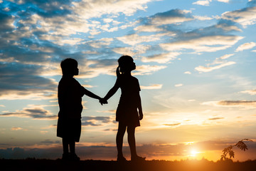 Wall Mural - Silhouette of children playing