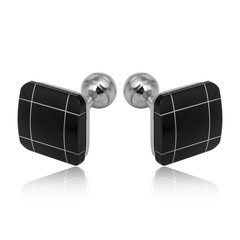 Silver cuff links on white