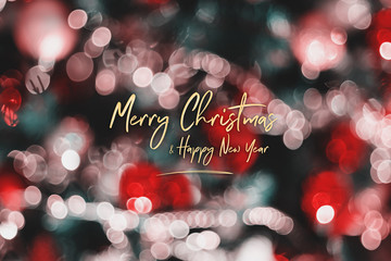 Leinwandbilder - Merry Christmas and happy new year on abstract blur decoration ball and light string on christmas tree with bokeh light background.winter holiday seasonal.