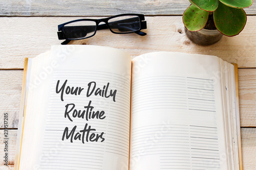 Fotomural Handwriting text writing Your Daily Routine Matters on notebook