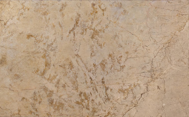 Brown marble wall or flooring pattern surface texture. Close-up of interior material for design decoration background