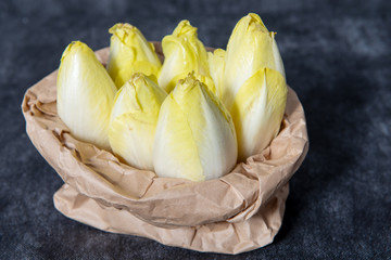 Canvas Print - paper bag with endives from France or Belgium