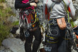© esalienko - Tools, gear and equipment on the belt of a rock climbers close-up.