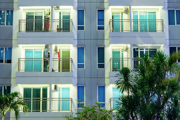 Wall Mural - Apartment windows at night.